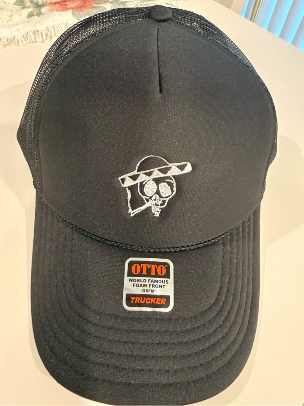 OTTO Black Trucker Hat with White Skull Embroidery